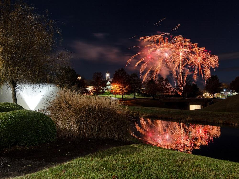 Wedding fireworks display at Colonial Heritage with reflections on the water